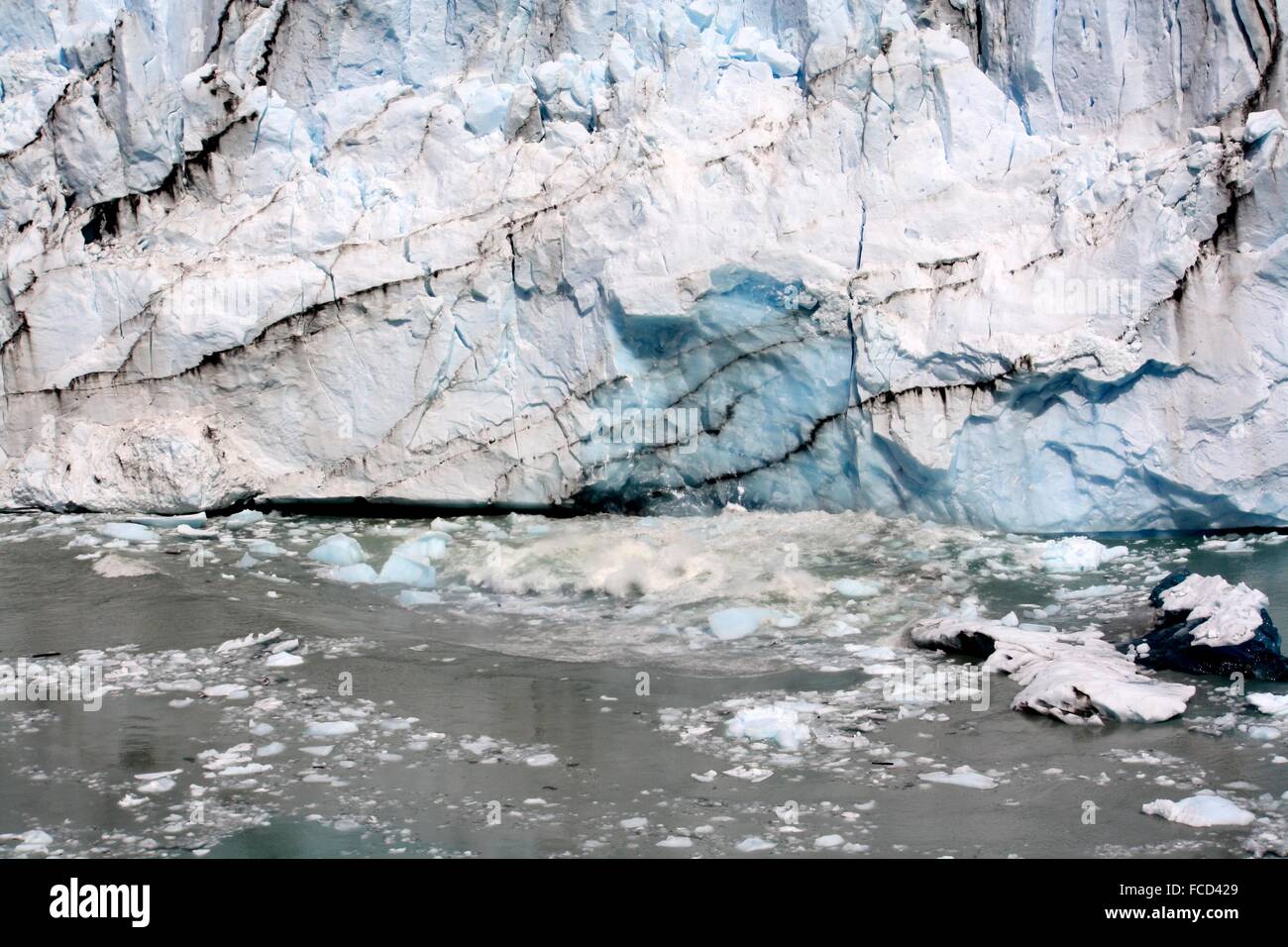 Pieces Of Ice Floating And Melting Near Glaciers Stock Photo