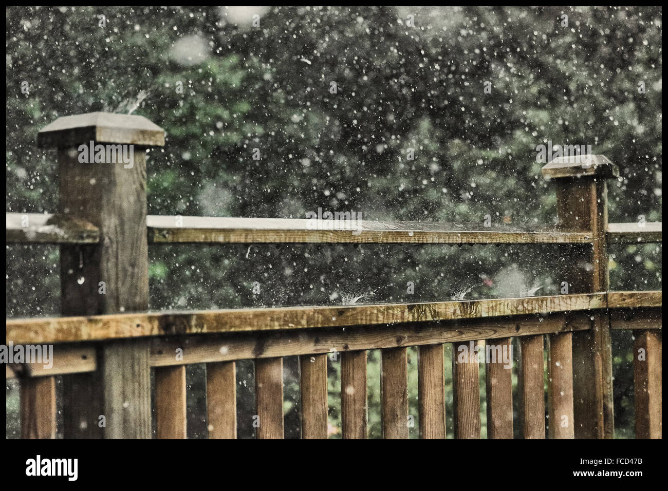 Wet Wooden Railing During Rain Stock Photo - Alamy
