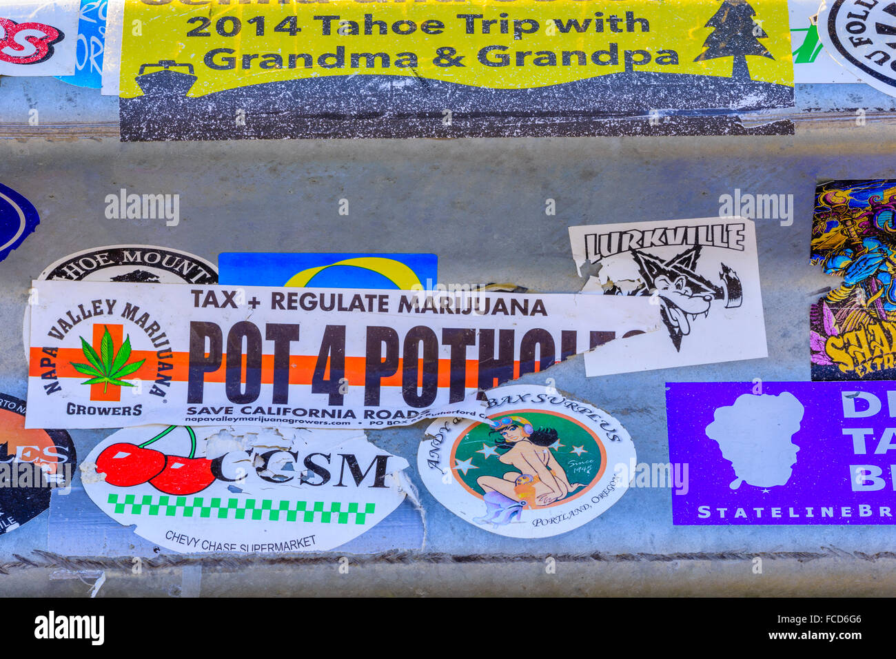 Bumper stickers on guard rail, Sierra Navada area, California Stock ...