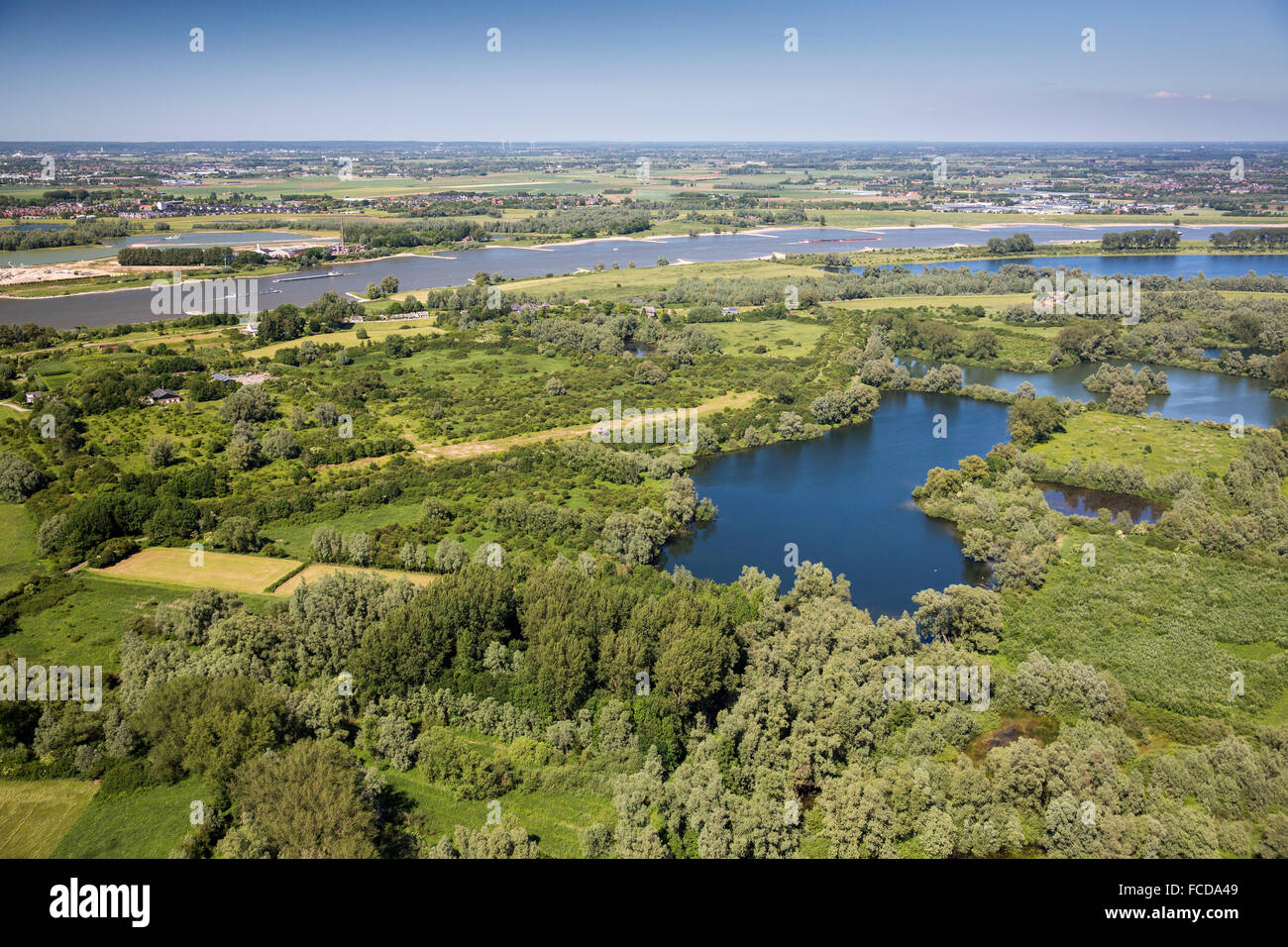 Netherlands, Ooij, Nature reserve Gelderse Poort. Waal river. Aerial Stock Photo