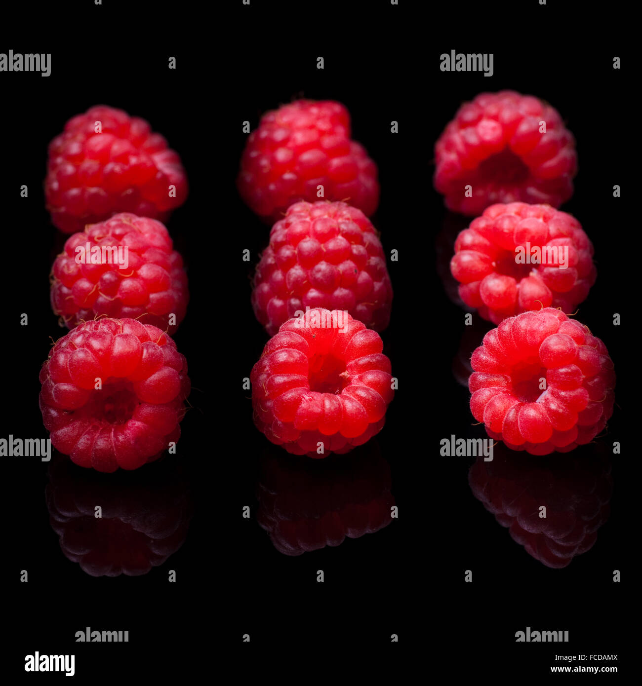 Sparkling Raspberry Close Up Raspberry closeup. Isolated on black Stock Photo - Alamy