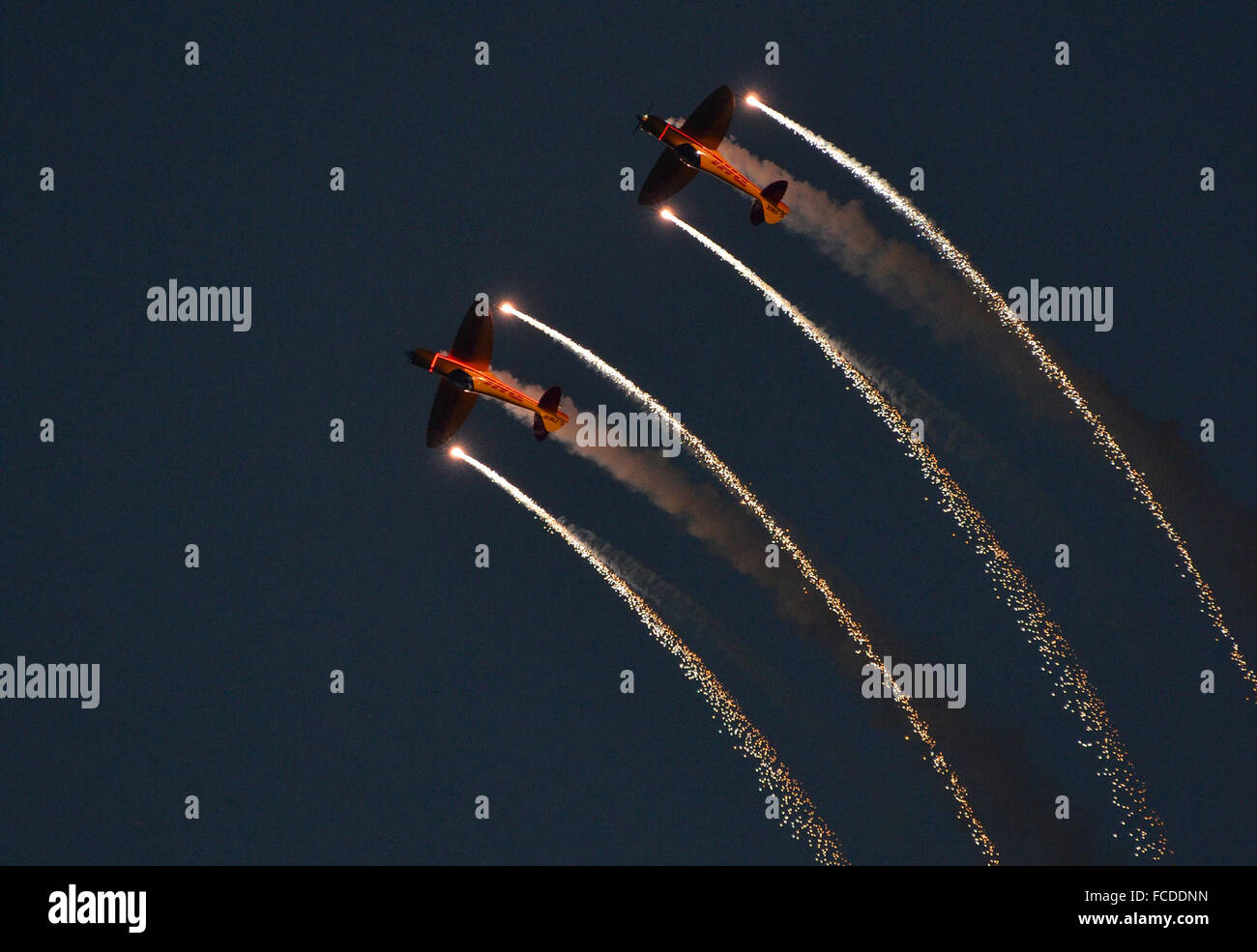 Bahrain Air Show, 21st January 2016. The Twister aerobatic team perform a stunning aerial ballet with pyrotechnics after sunset at the 2016 Bahrain Air Show. Credit:  Steve Nichols/Alamy Live News Stock Photo
