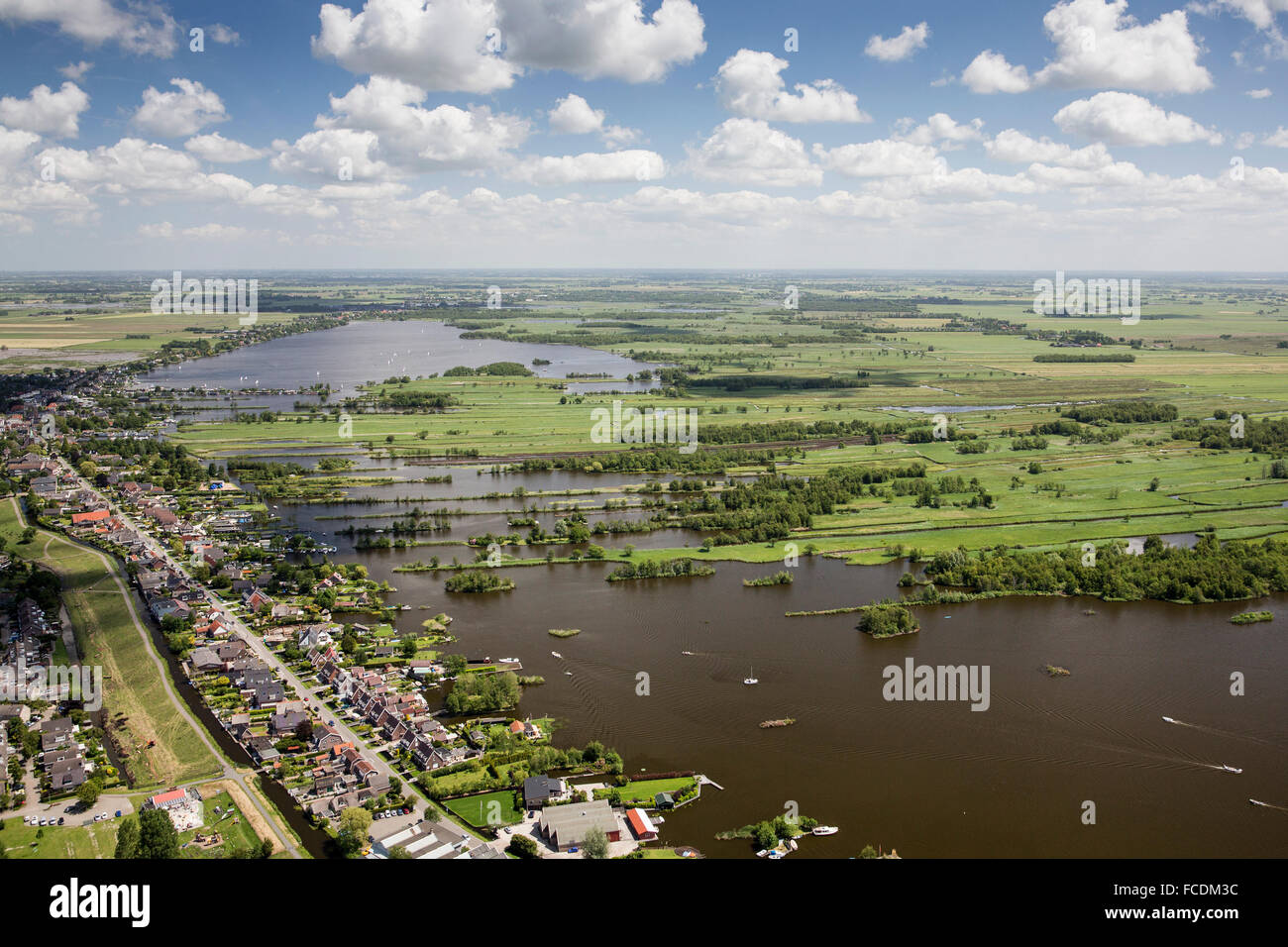 Netherlands, Nieuwkoop, Lakes and yachts on lakes called Nieuwkoopse Plassen. Aerial Stock Photo