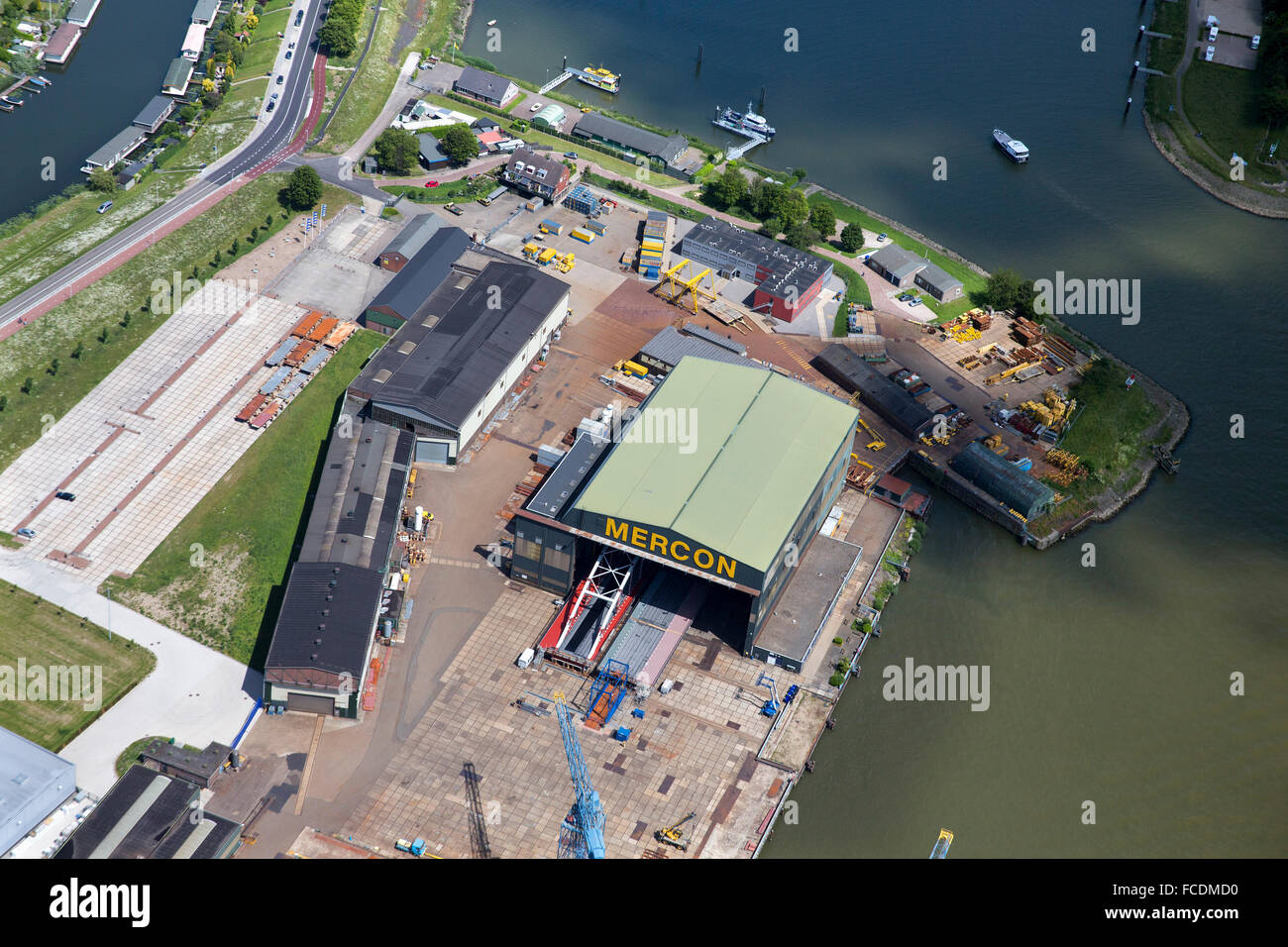 Netherlands, Gorinchem. Company constructing bridges. Aerial Stock Photo