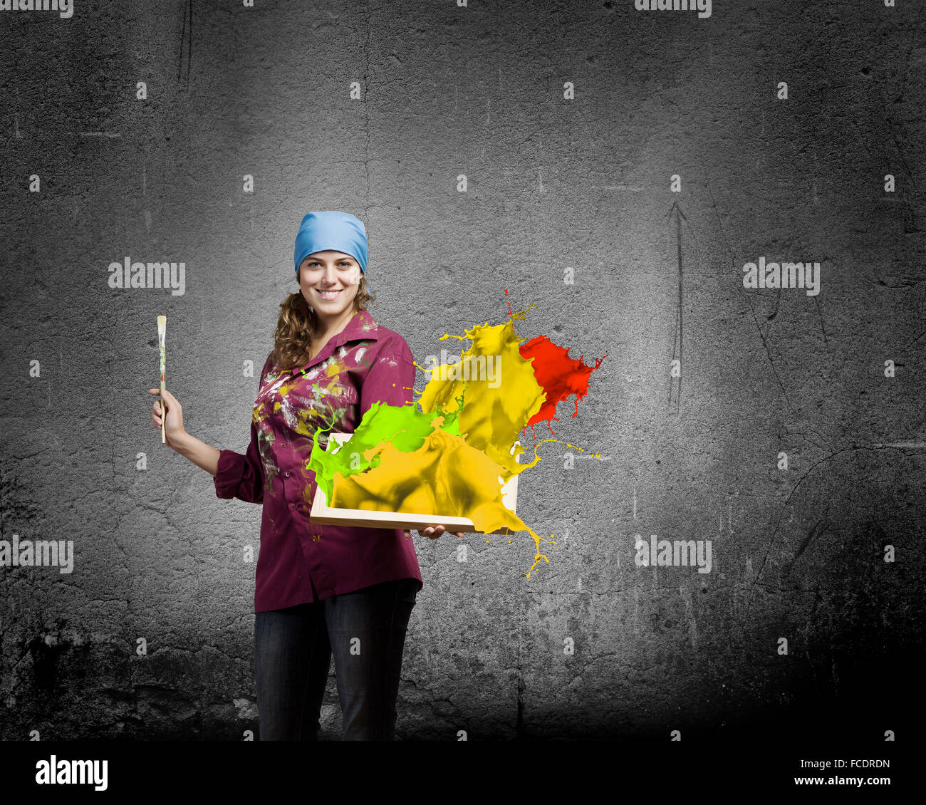 Young woman painter with palette and brush Stock Photo - Alamy