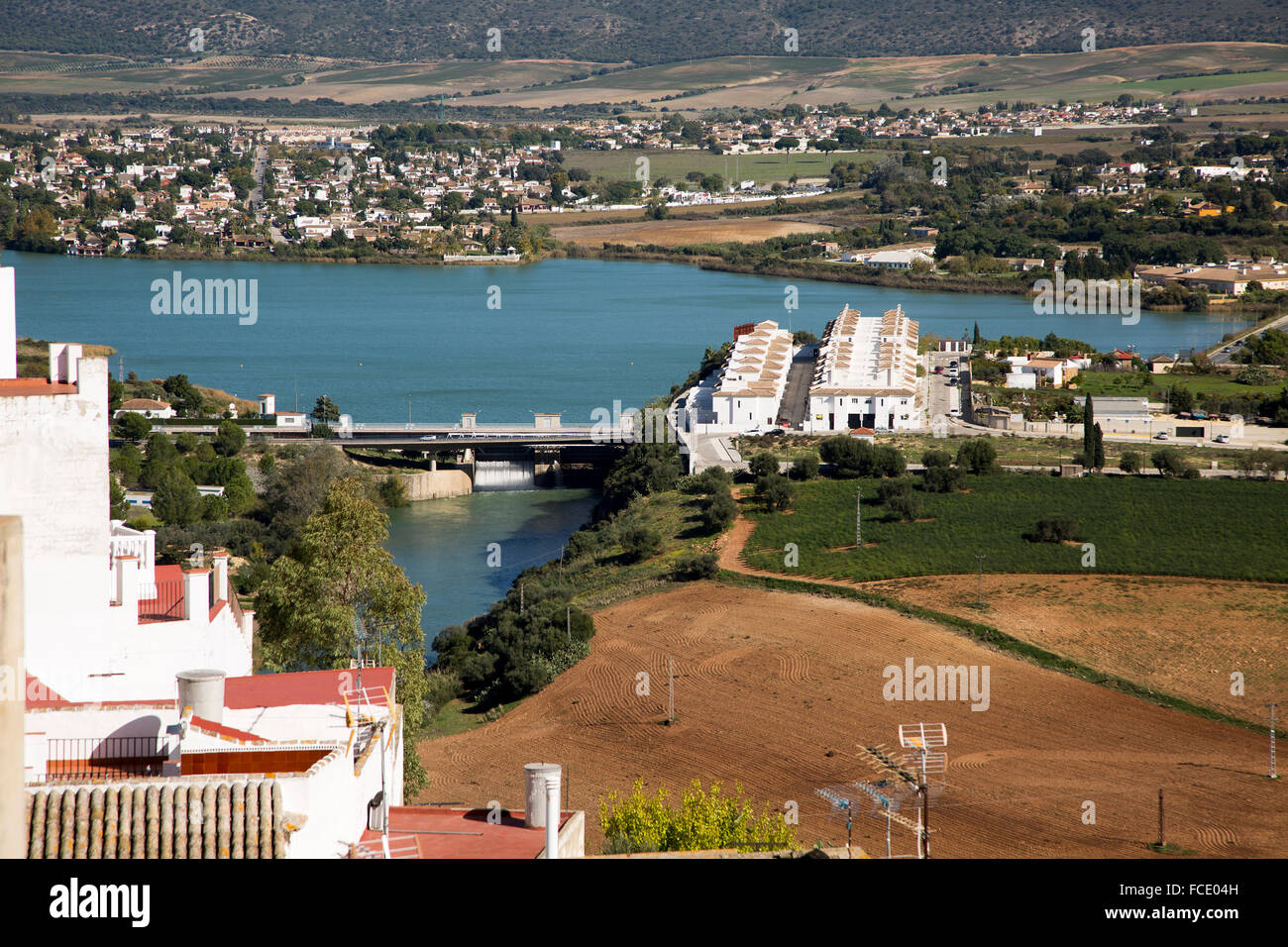 Reservoir lake occupying flooded valley land, village of Arcos de la Frontera, Cadiz province, Spain Stock Photo