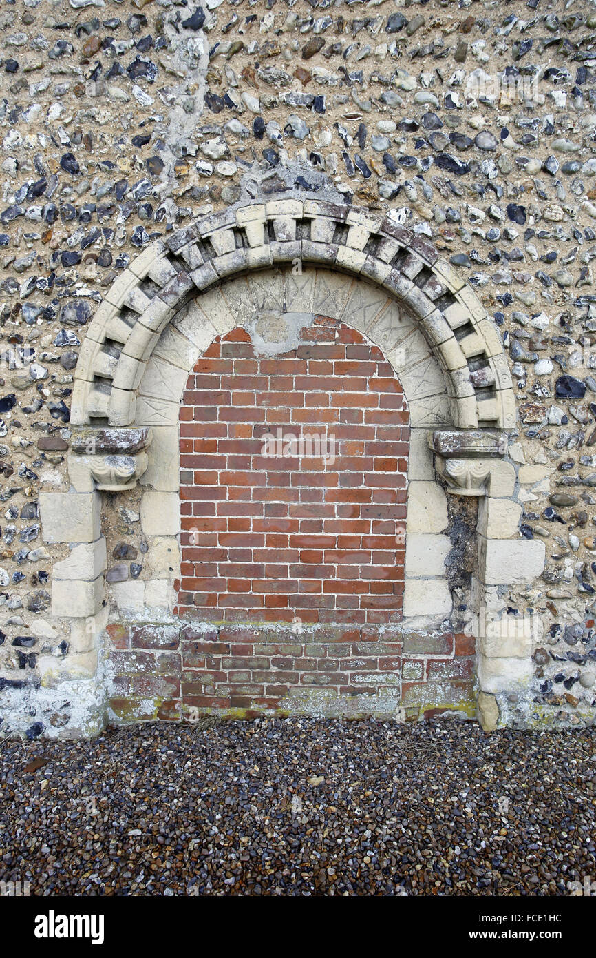 Norman north door, now bricked up. St Edmund's Church, South Burlingham, Norfolk Stock Photo
