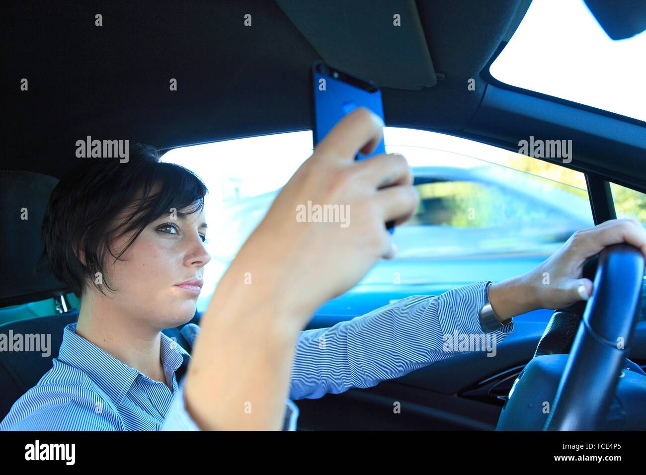 Woman in car hi-res stock photography and images - Alamy