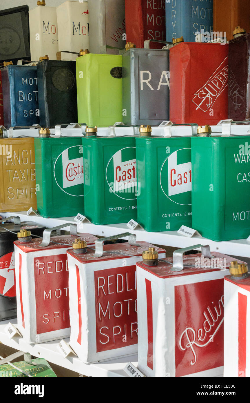 Display of vintage 'motor spirit' (petrol, gasoline) cans. Stock Photo
