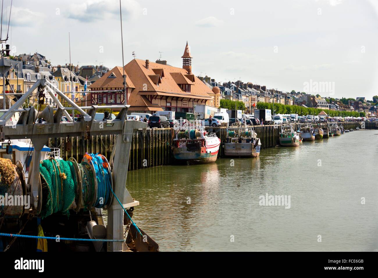 France, Normandy, fish boats alongside the banks in Trouville Stock Photo