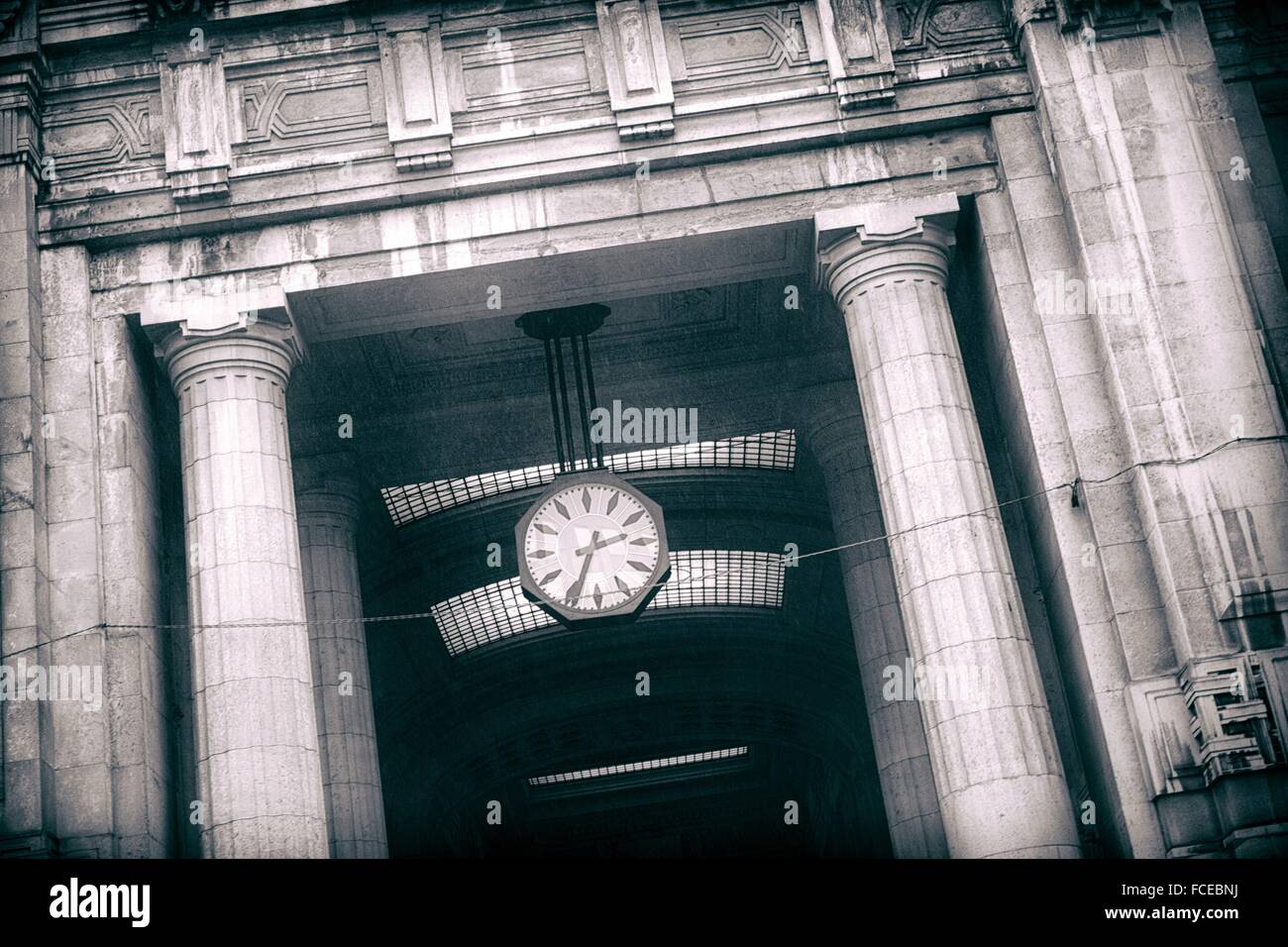 clock ticking 2:35 p.m., in the building of the railway station of Milan, Italy, Europe. Stock Photo