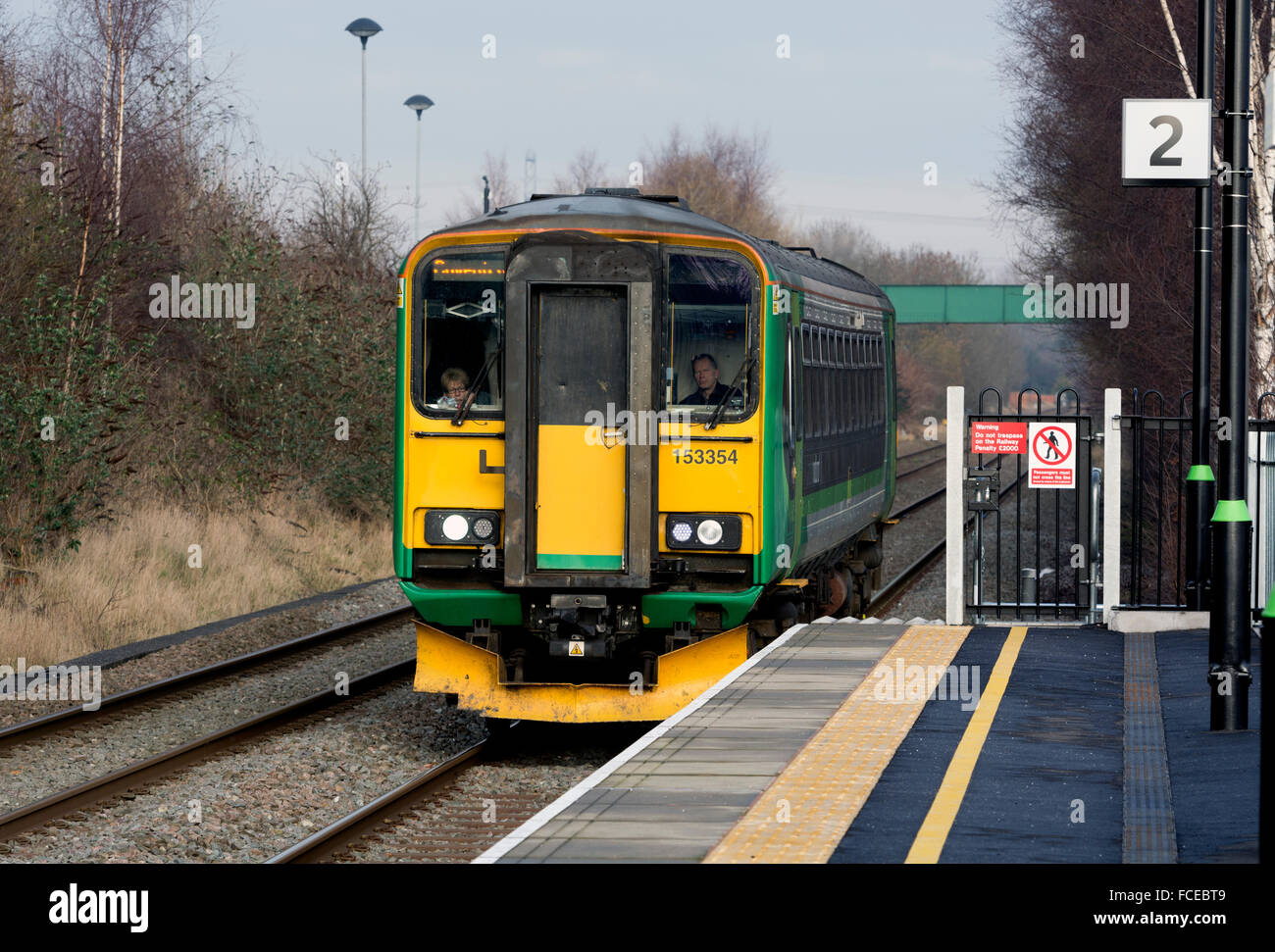 London Midland class 153 diesel train arriving at Coventry Arena station, Coventry, UK Stock Photo