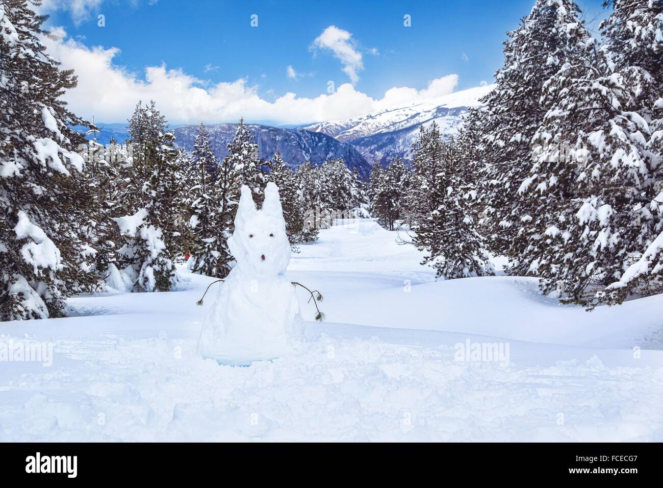 Snowman in the forest Stock Photo