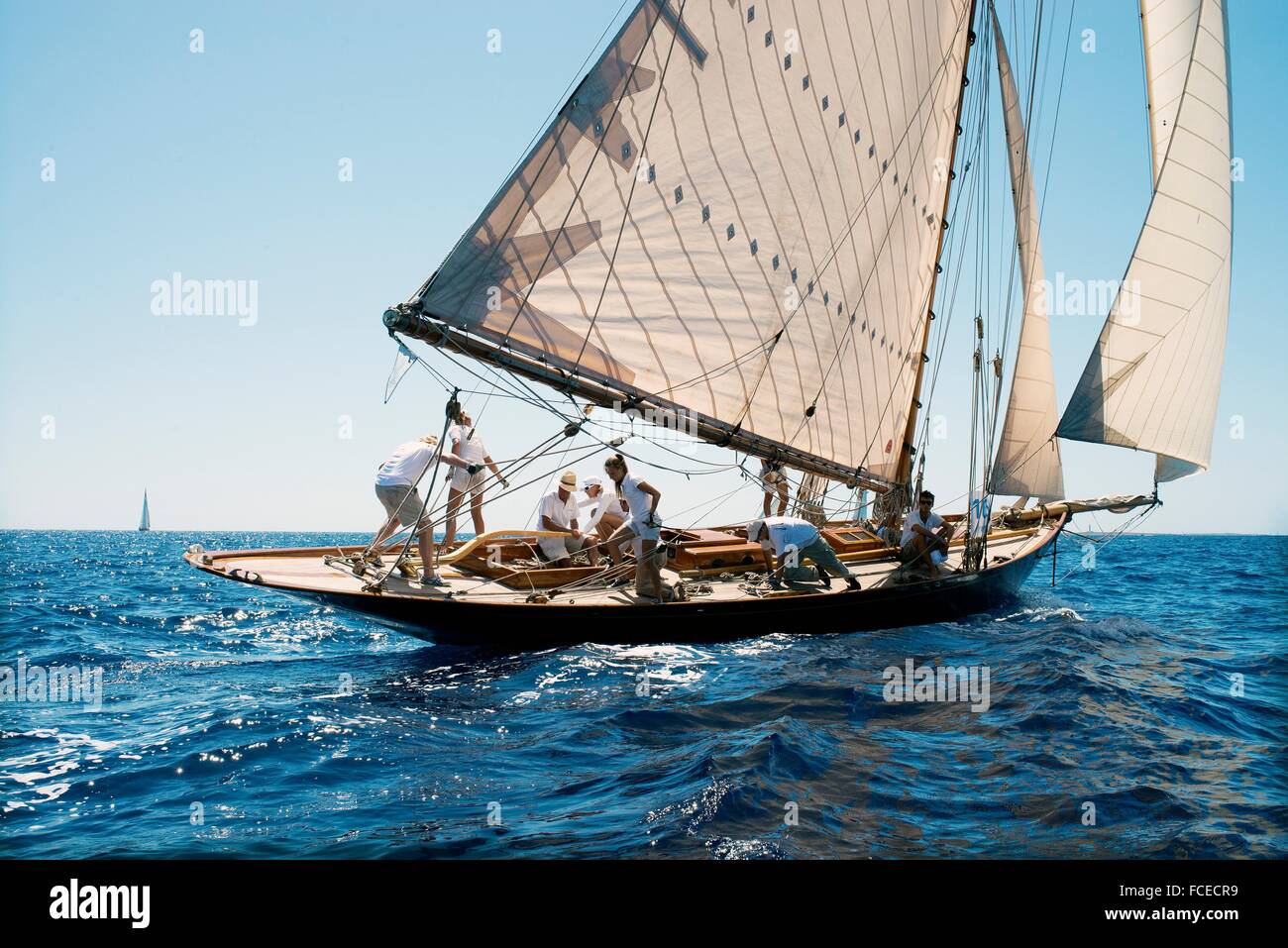 Vintage sailing boat in a race, at the Mediterranean Sea. Menorca