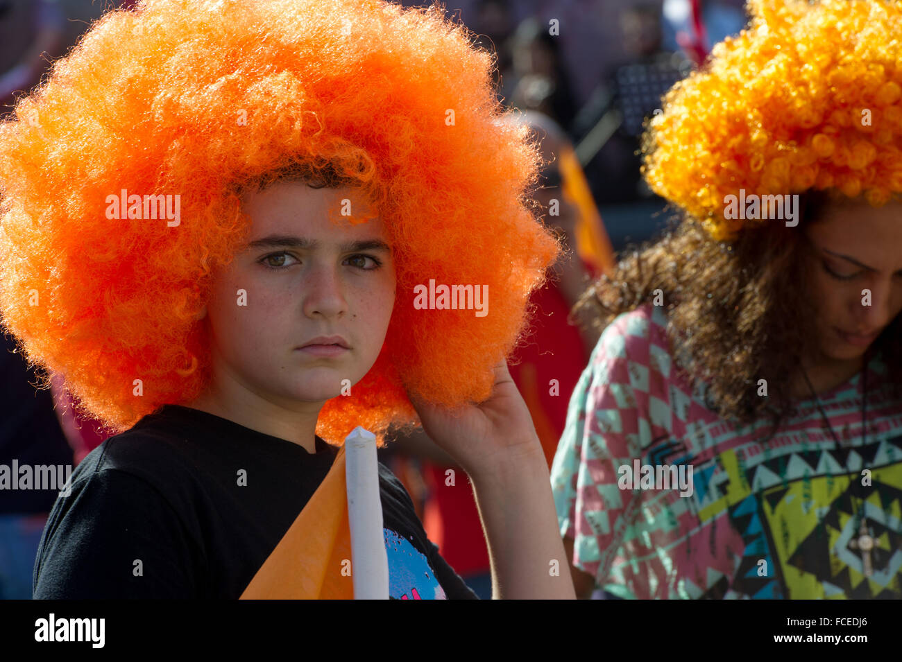 Orange protest wear artificial  Hair to confirm loyalty Stock Photo