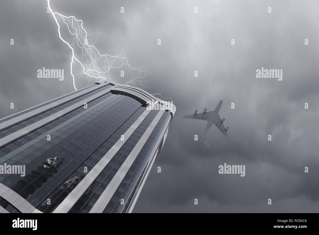 Bottom view of airplane flying above skyscrapers Stock Photo - Alamy