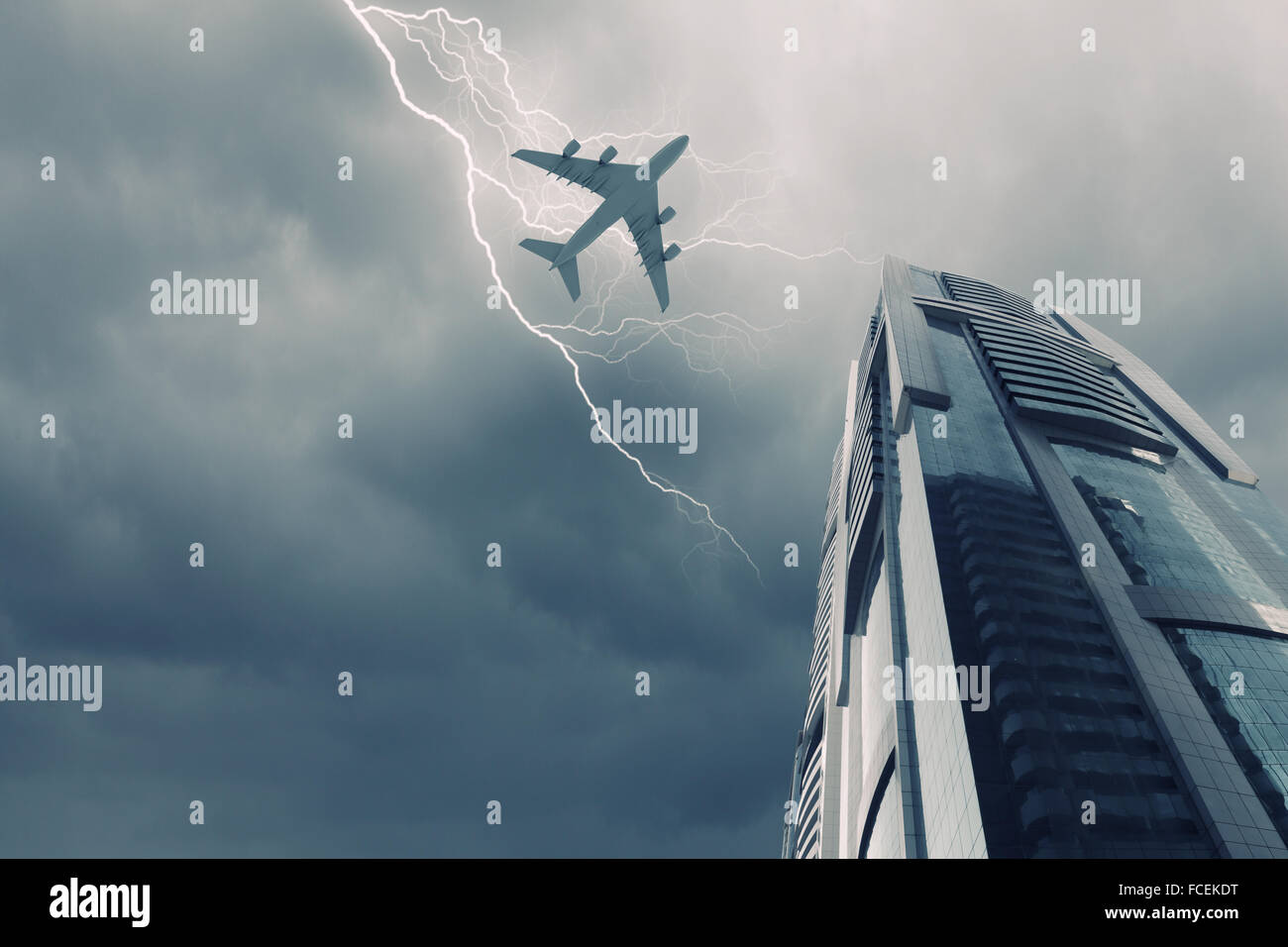 Bottom view of airplane flying above skyscrapers Stock Photo - Alamy