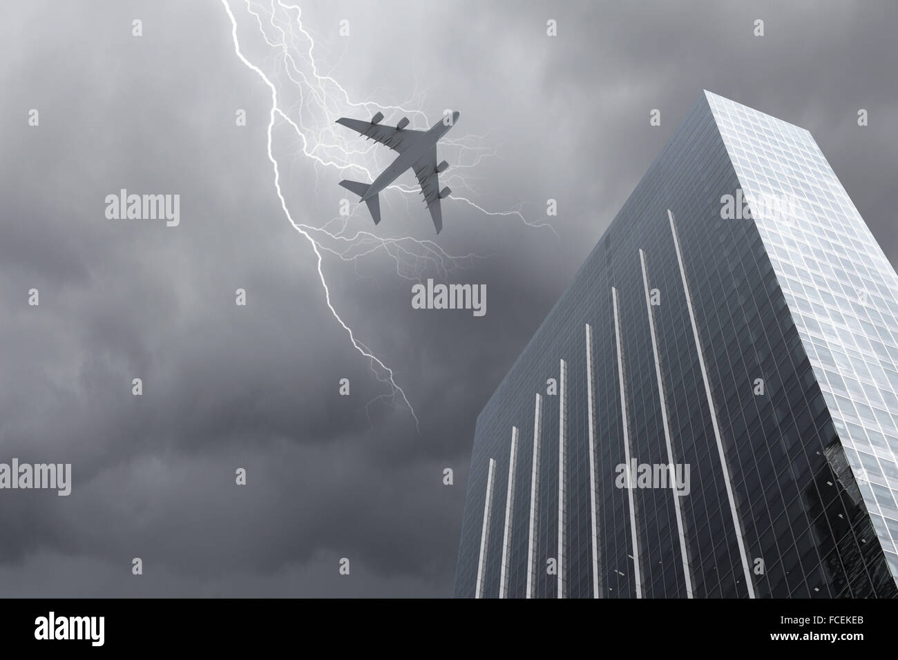 Bottom view of airplane flying above skyscrapers Stock Photo - Alamy