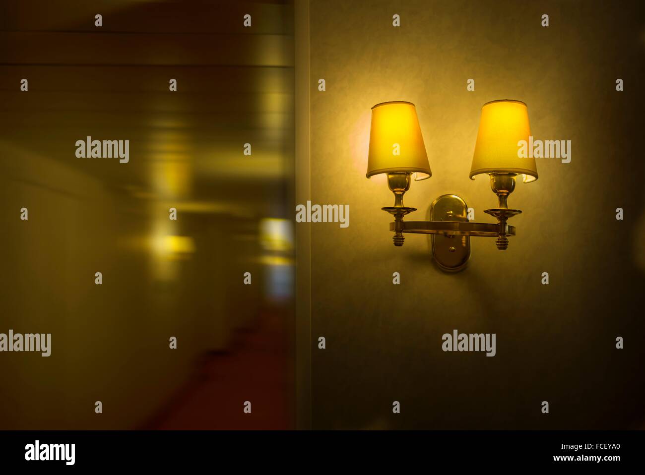 Lamp in an hotel corridor, Belgium Stock Photo