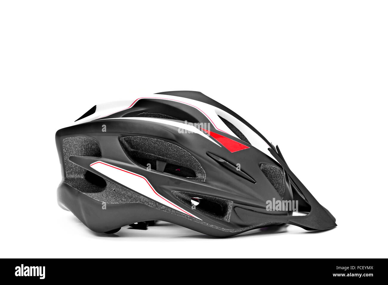 a protective helmet for different sports such as cycling or skating on a white background Stock Photo