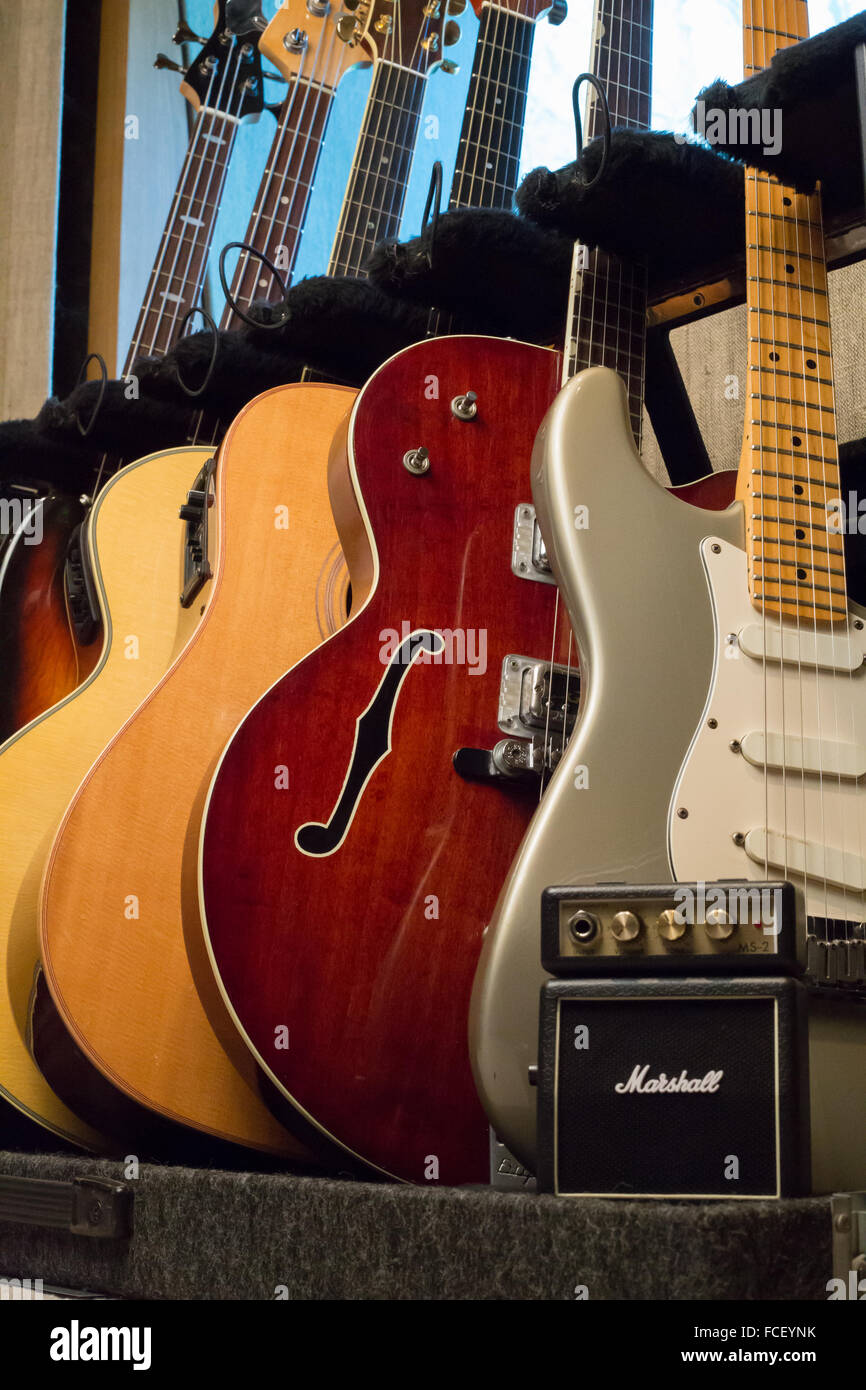 Electric guitars, acoustic guitars, electric bass guitars and amplifier