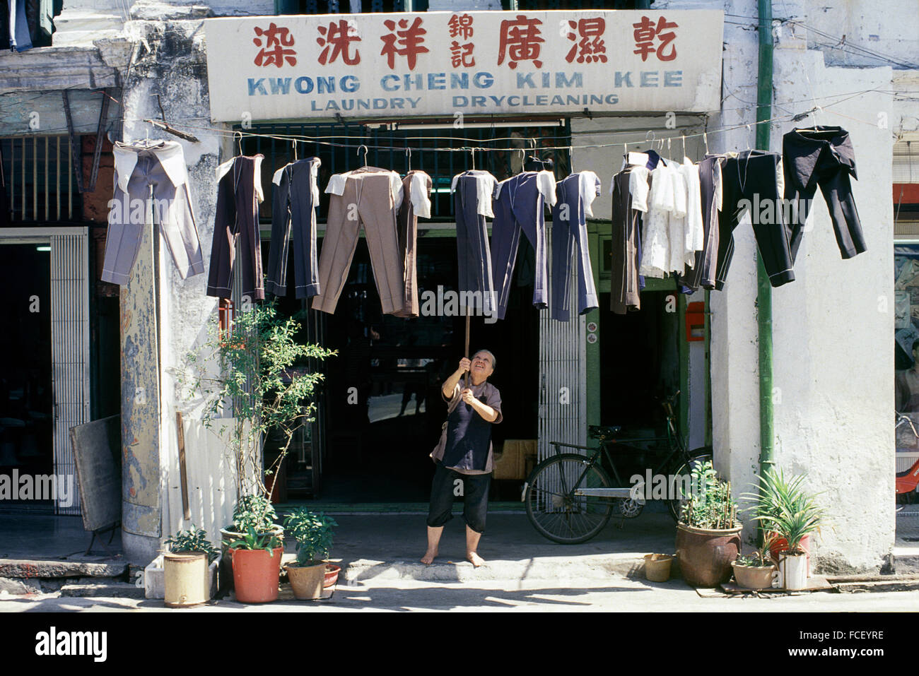Old Singapore circa 1982 laundry dry cleaning shop Stock Photo