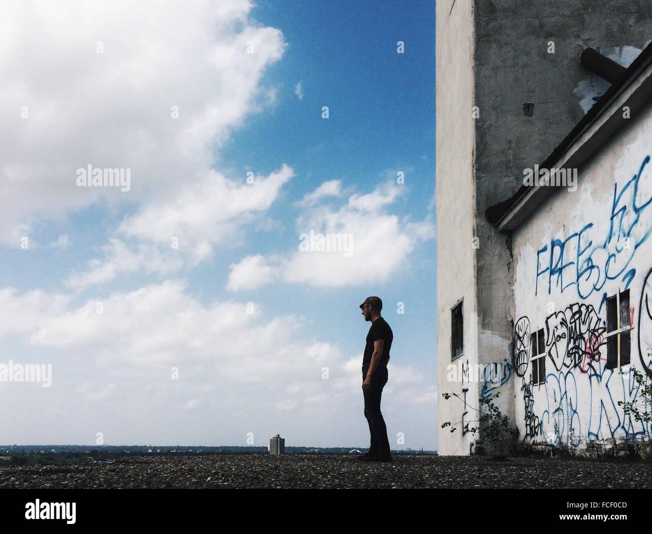 Man Standing In Front Of Old Building Stock Photo - Alamy
