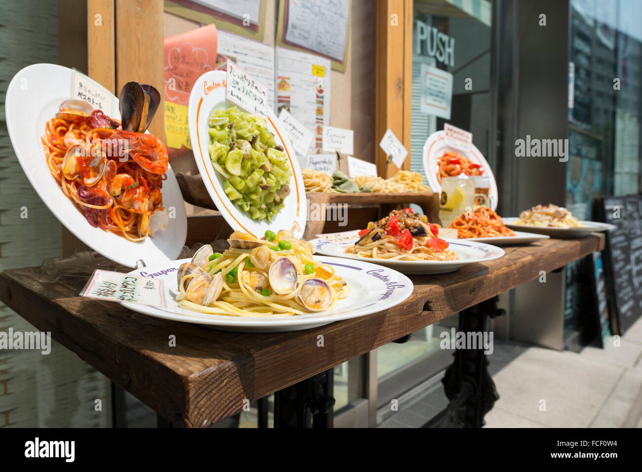 Wax models of pasta dishes outside a restaurant in Roppongi, Tokyo, Japan Stock Photo