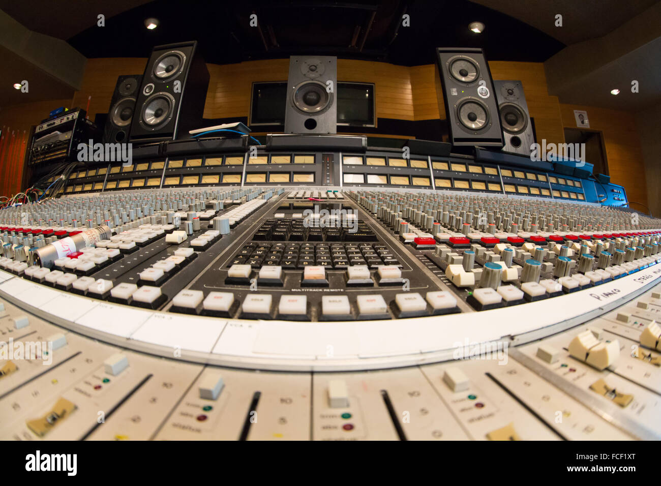 frint view of ssl e series sound mixing desk with focal professional twin 6be and pro ac studio 100 and 1mk 2 studio speakers Stock Photo