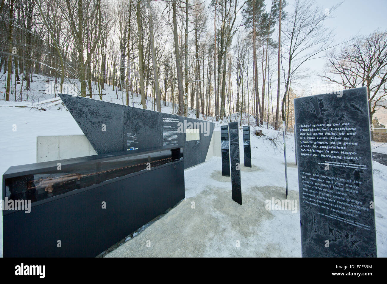 A view of information panels in the snow covered surroundings of the Holocaust memorial on the premises of the concentration camp documentation centre Hersbruck/Happurg in Hersbruck, Germany, 22 January 2016. The second largest satellite camp of concentration camp Flossenbuerg was located in Hersbruck between July 1944 and April 1945. Up to 1,500 prisoners were held in the camp, who were used as forced labourer to build the facilities for an underground armaments factory. The documentation centre Hersbruck/Happurg will open officially on 25 January 2016. PHOTO: DANIEL KARMANN/dpa Stock Photo