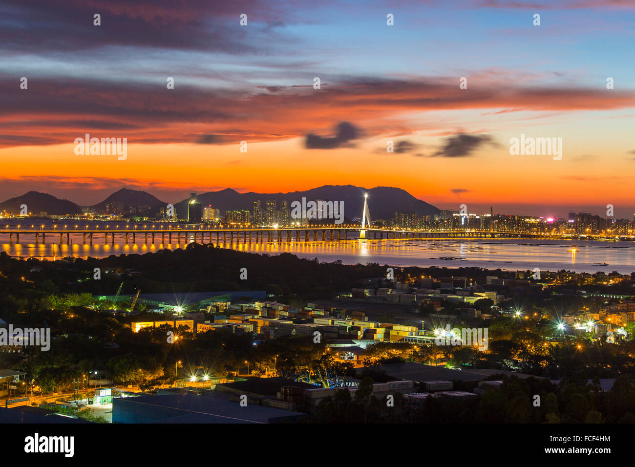 Sunset at modern bridge in Hong Kong Stock Photo - Alamy