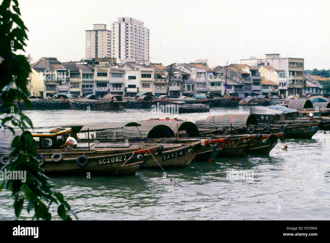 Old Singapore Bum Boats on Singapore River circa 1982 Stock Photo