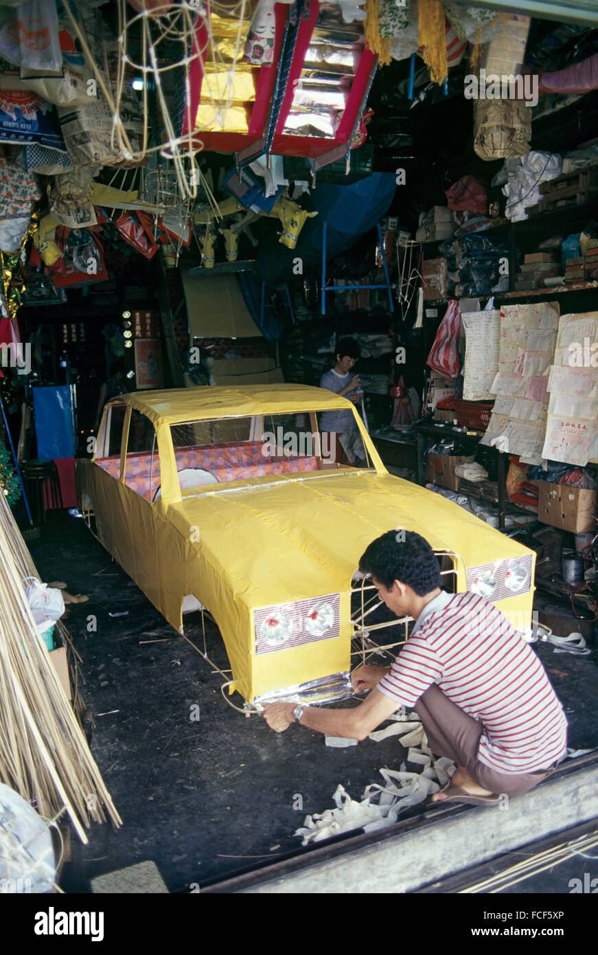 Chinese Craftsman Completes Paper Replica Of Car To Be Burnt At A Chinese Funeral Stock Photo Alamy