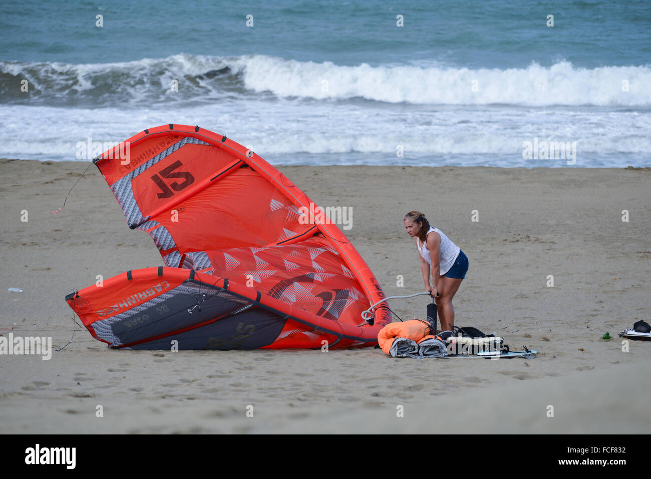 Female preparing for kitesurfing. Dorado, Puerto Rico. Caribbean Island