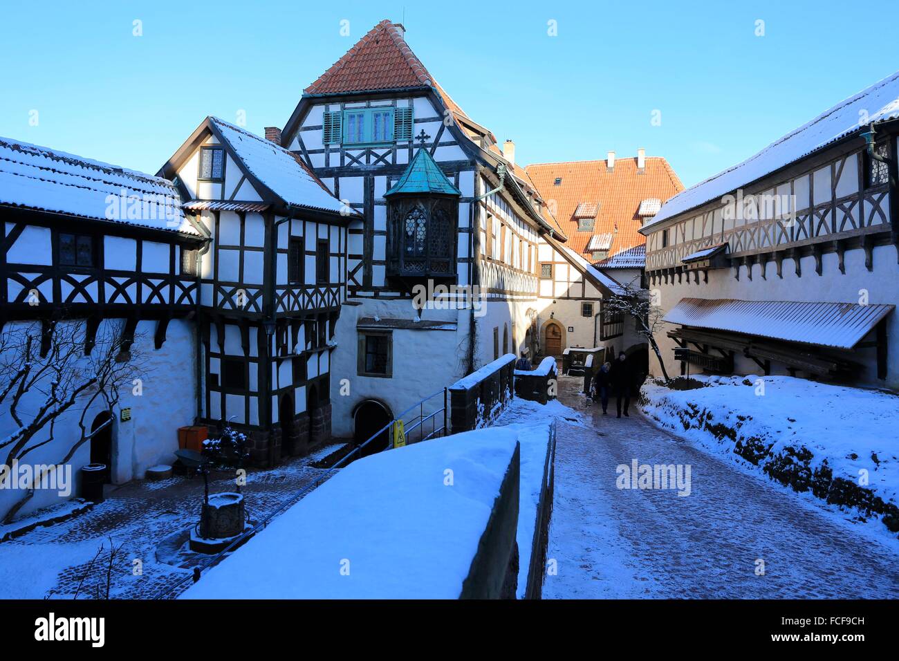Castle yard of the Wartburg with the Elisabethen passage right. The Wartburg in Eisenach was built around 1067. Now it is a UNESCO World Heritage Site. The Wartburg became famous through the countess Elisabeth and Martin Luther. Date: January 19, 2016 Stock Photo