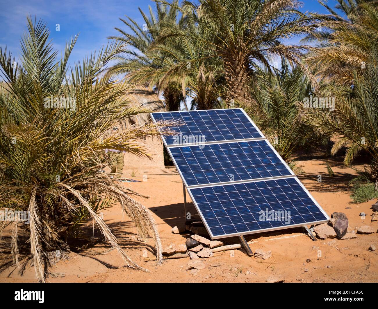 Solar panel on desert landscape in Tisserdmine Oasis, Morocco Stock