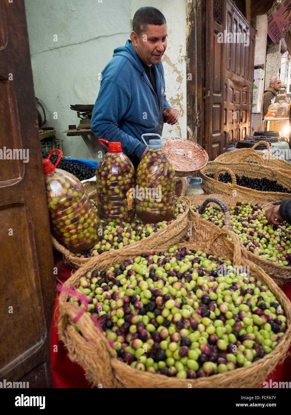 Men selling olives at store in the Medina, Fez, Morocco Stock Photo Alamy
