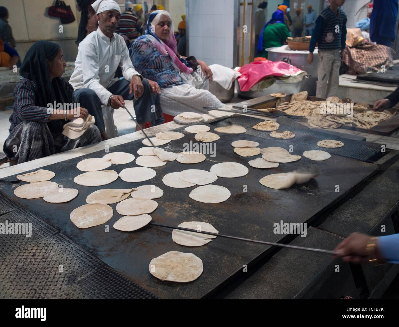 Bread making at Gurudwara Bangla Sahib shrine, New Delhi, India Stock