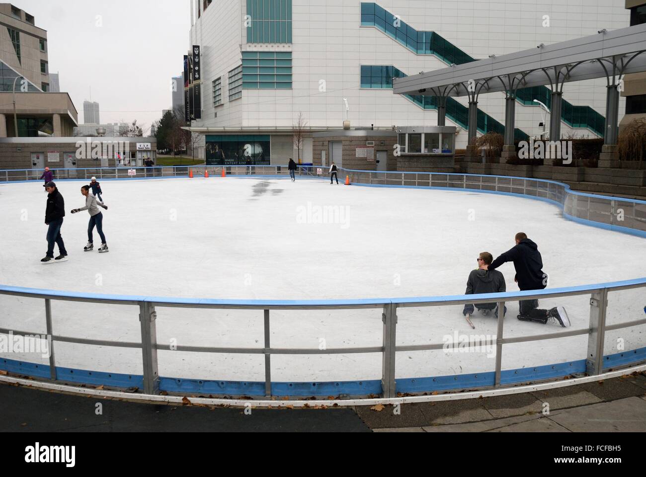 People skating on the outdoor skating rink at Charles Clark Square