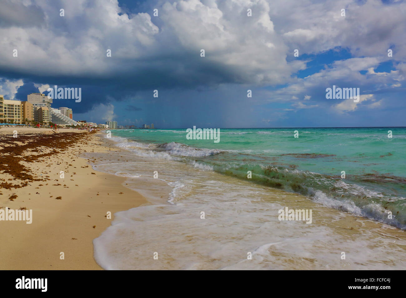 Storm clouds and rain over the beach at Cancun, Mexico Stock Photo Alamy