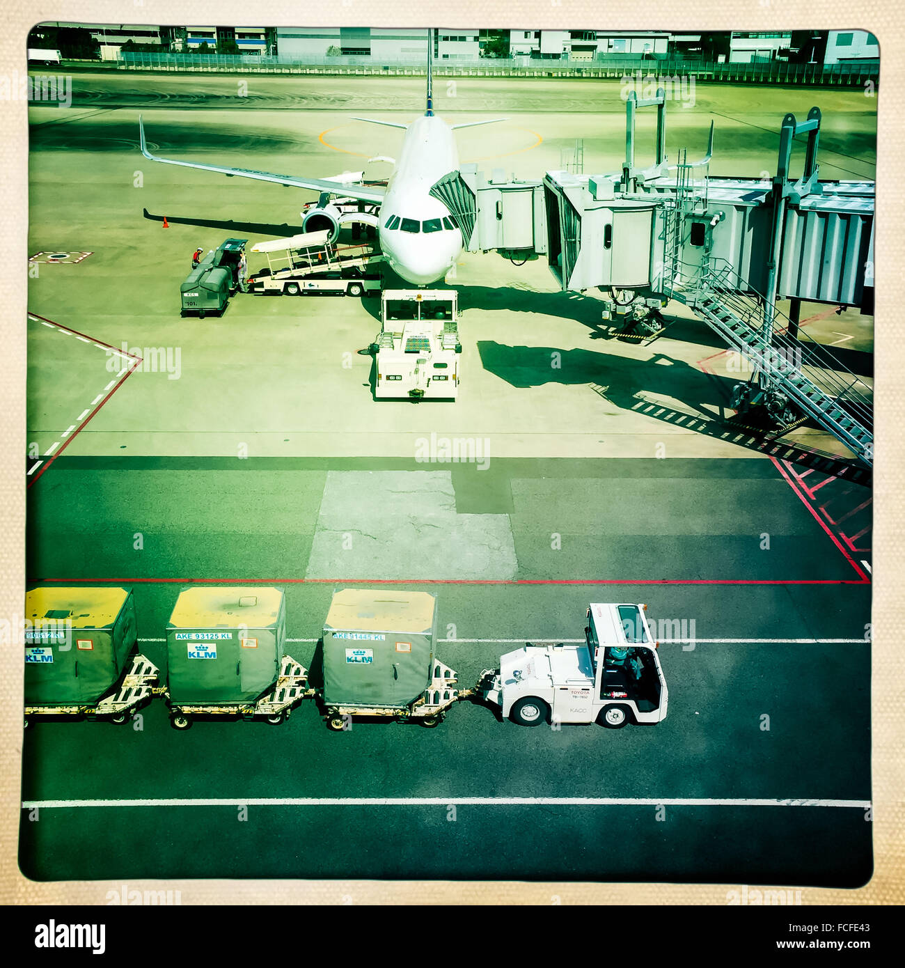 Plane on the tarmac of an airport Stock Photo - Alamy