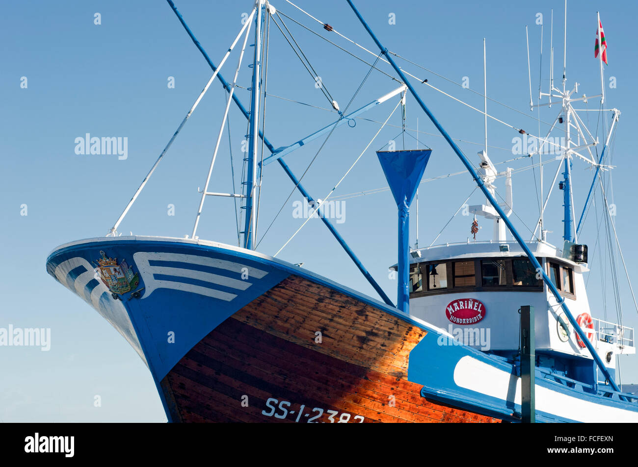 Horizontal picture of commercial tuna fishing vessel in port. Hondarribia, Basque Country, Spain. Stock Photo