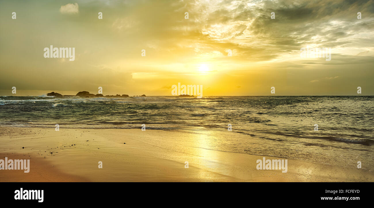 Golden sunset over the sea. Sri Lanka. Panorama Stock Photo