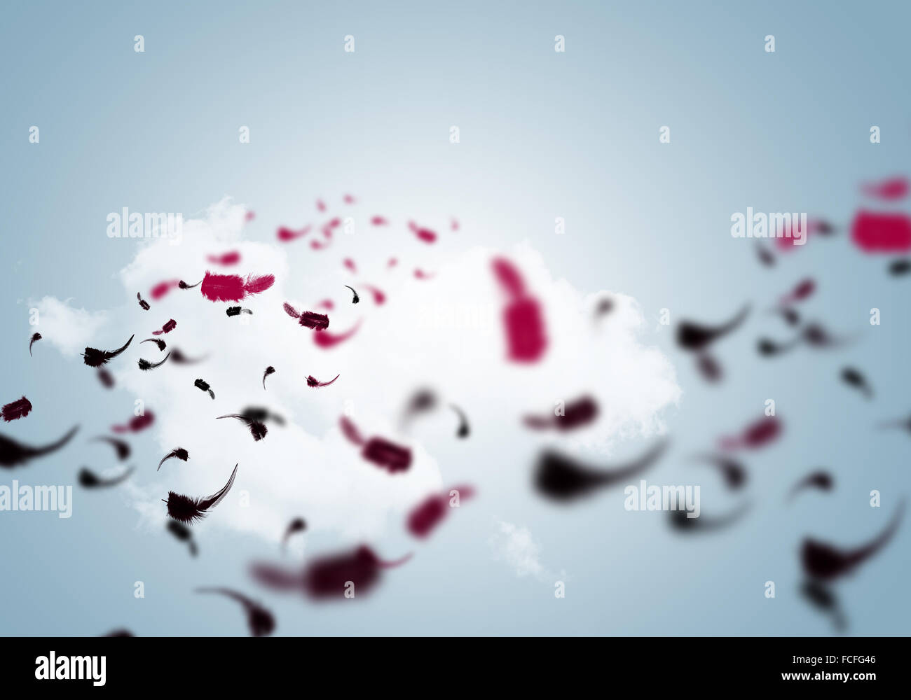 Abstract background image of feathers flying in air Stock Photo - Alamy