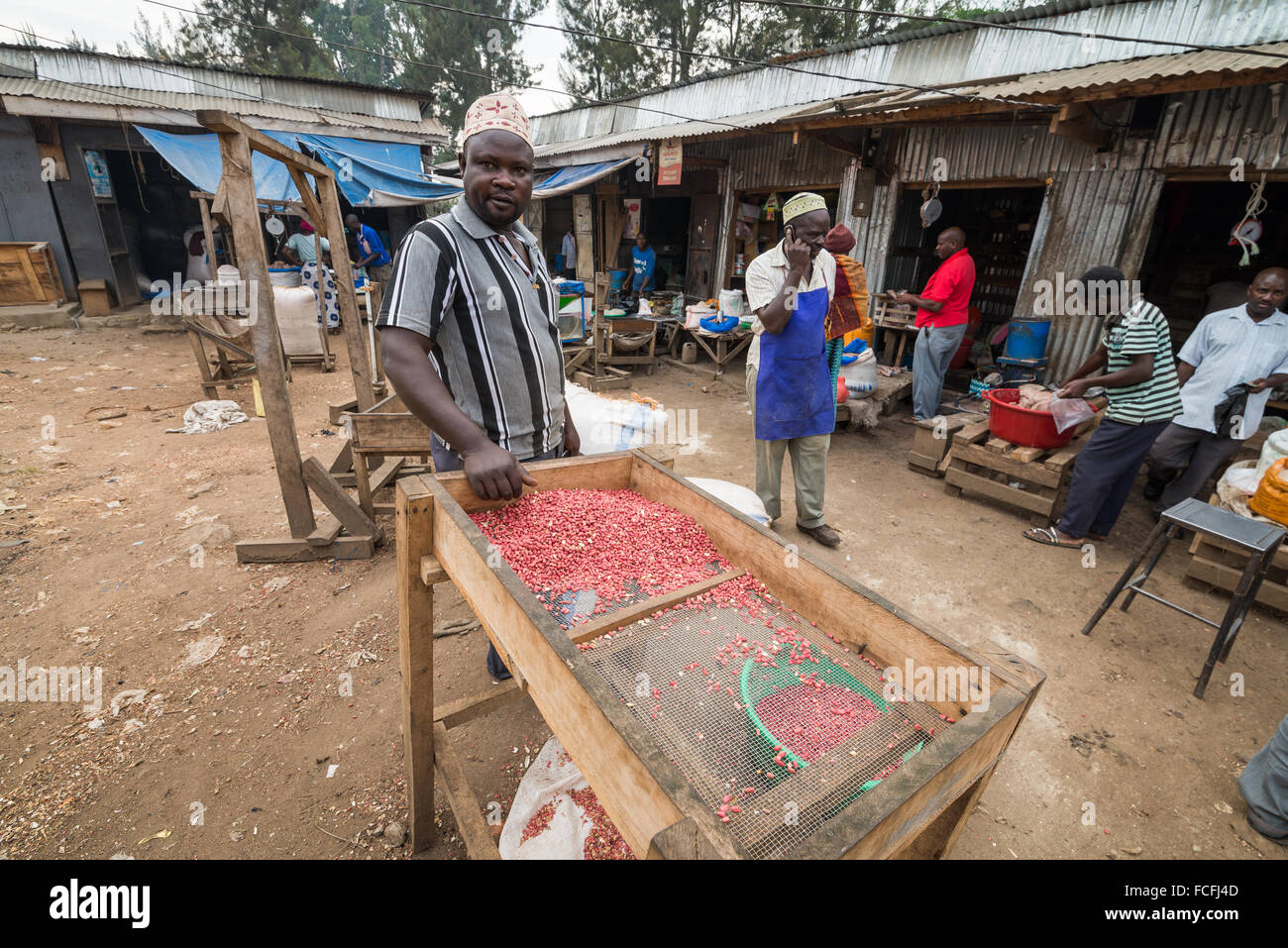 Sale and manufacture of peanut butter on the market in the Fort Portal, Uganda, Africa Stock