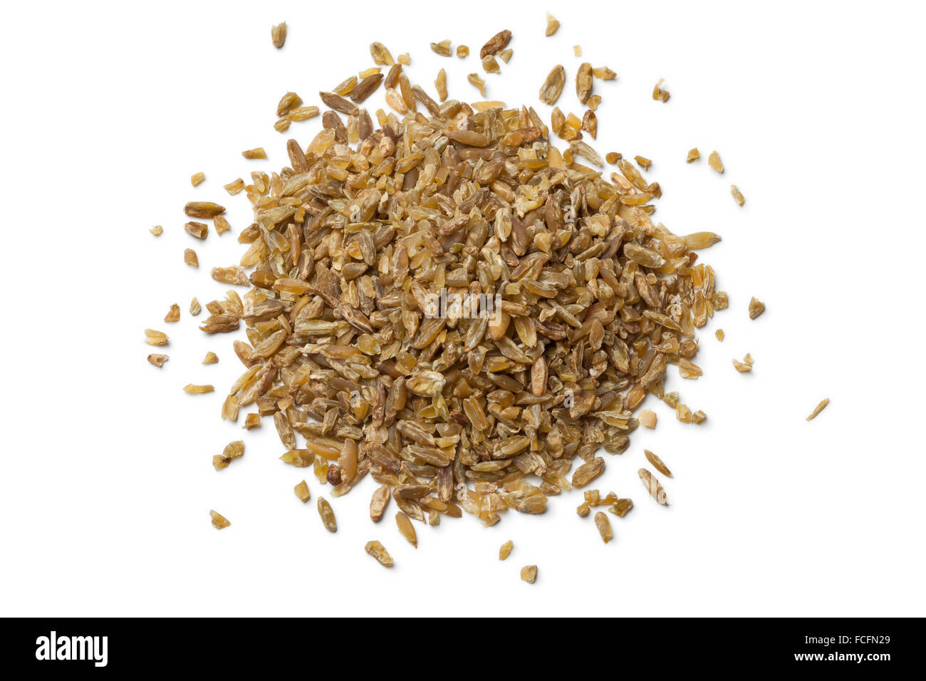 Heap of raw Freekeh on white background Stock Photo