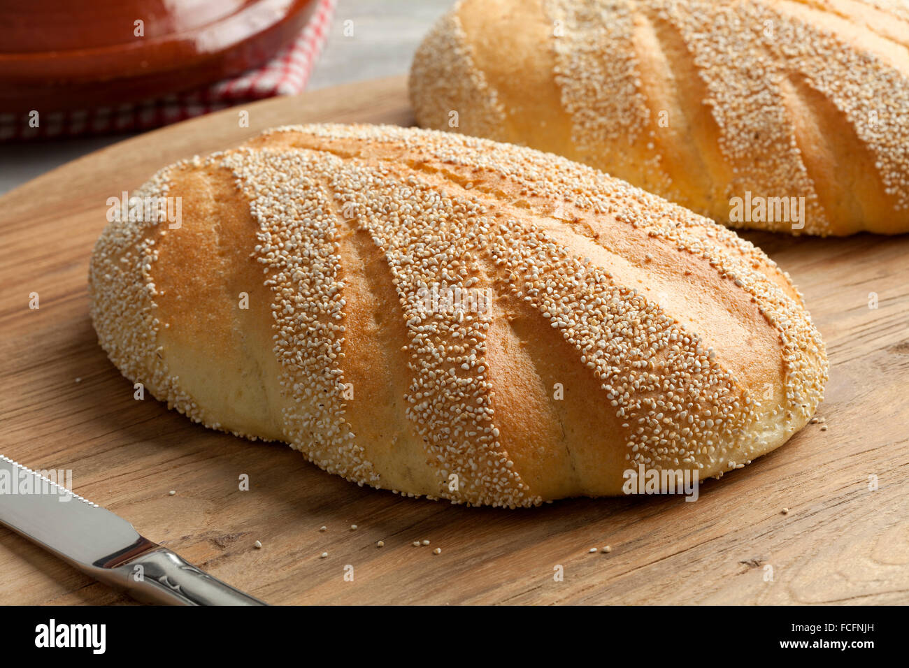 Traditional whole fresh baked Moroccan semolina bread Stock Photo