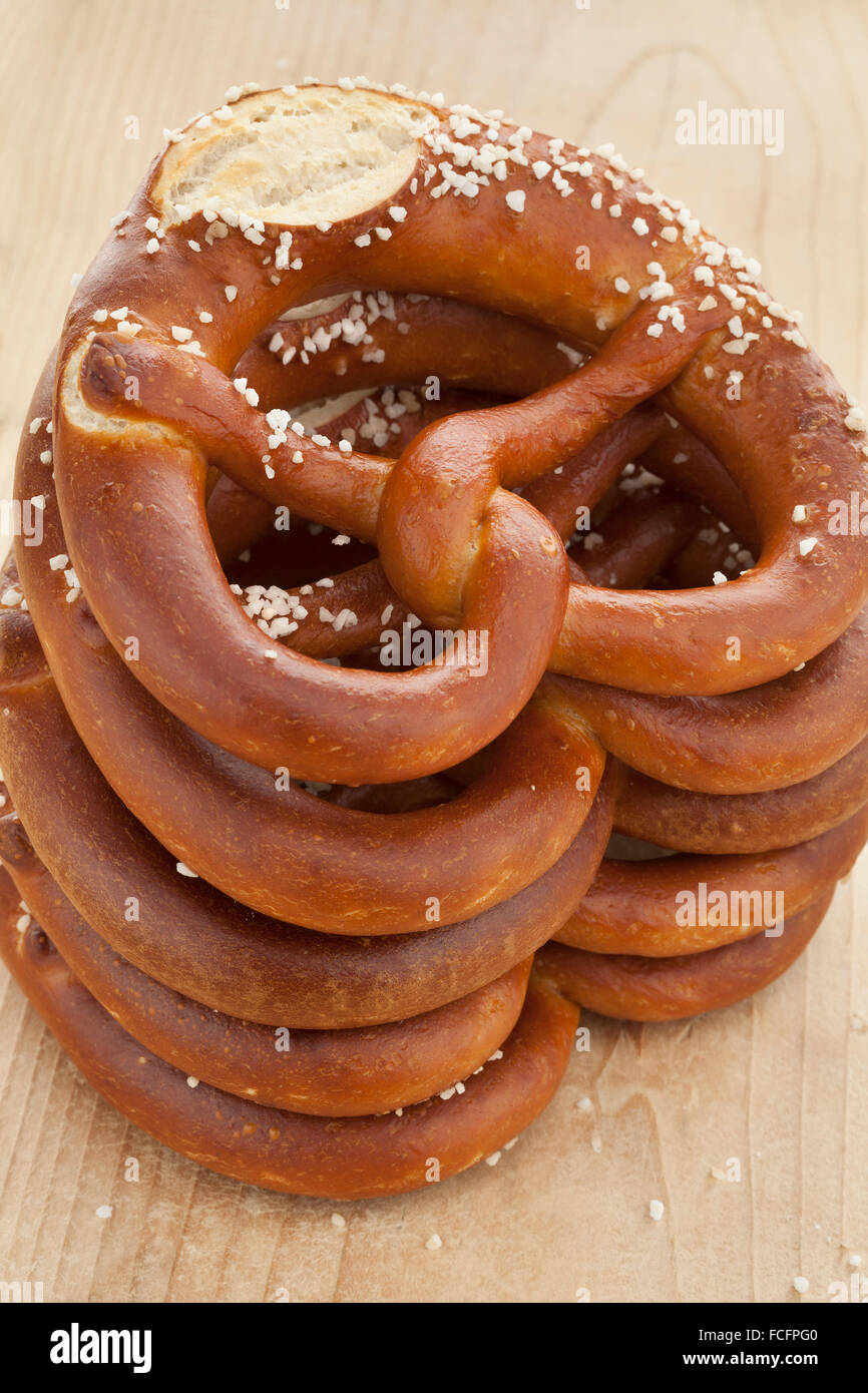 Pile of fresh soft pretzels with salt Stock Photo