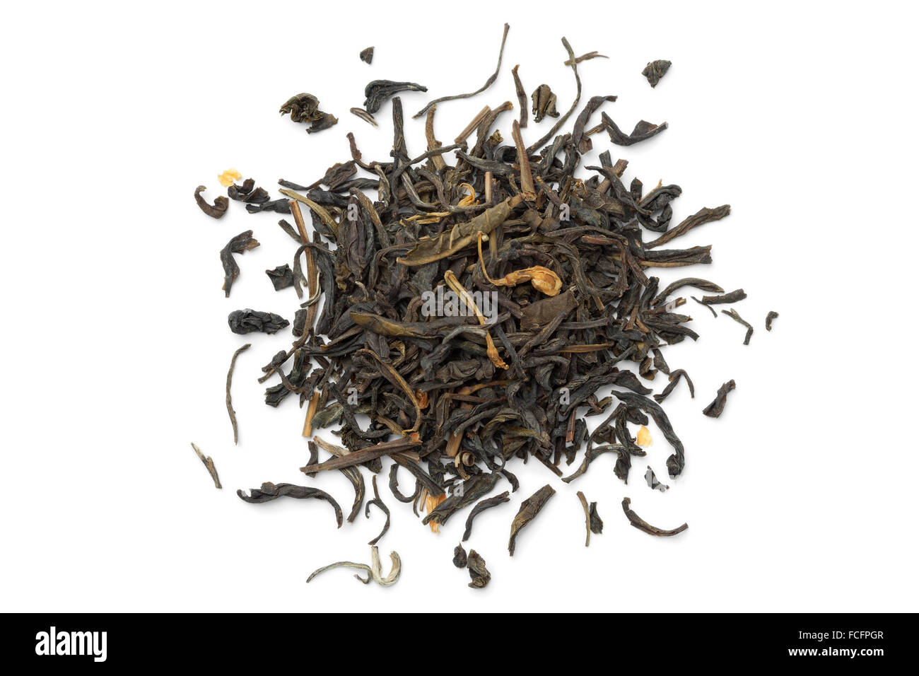 Heap of dried green tea on white background Stock Photo