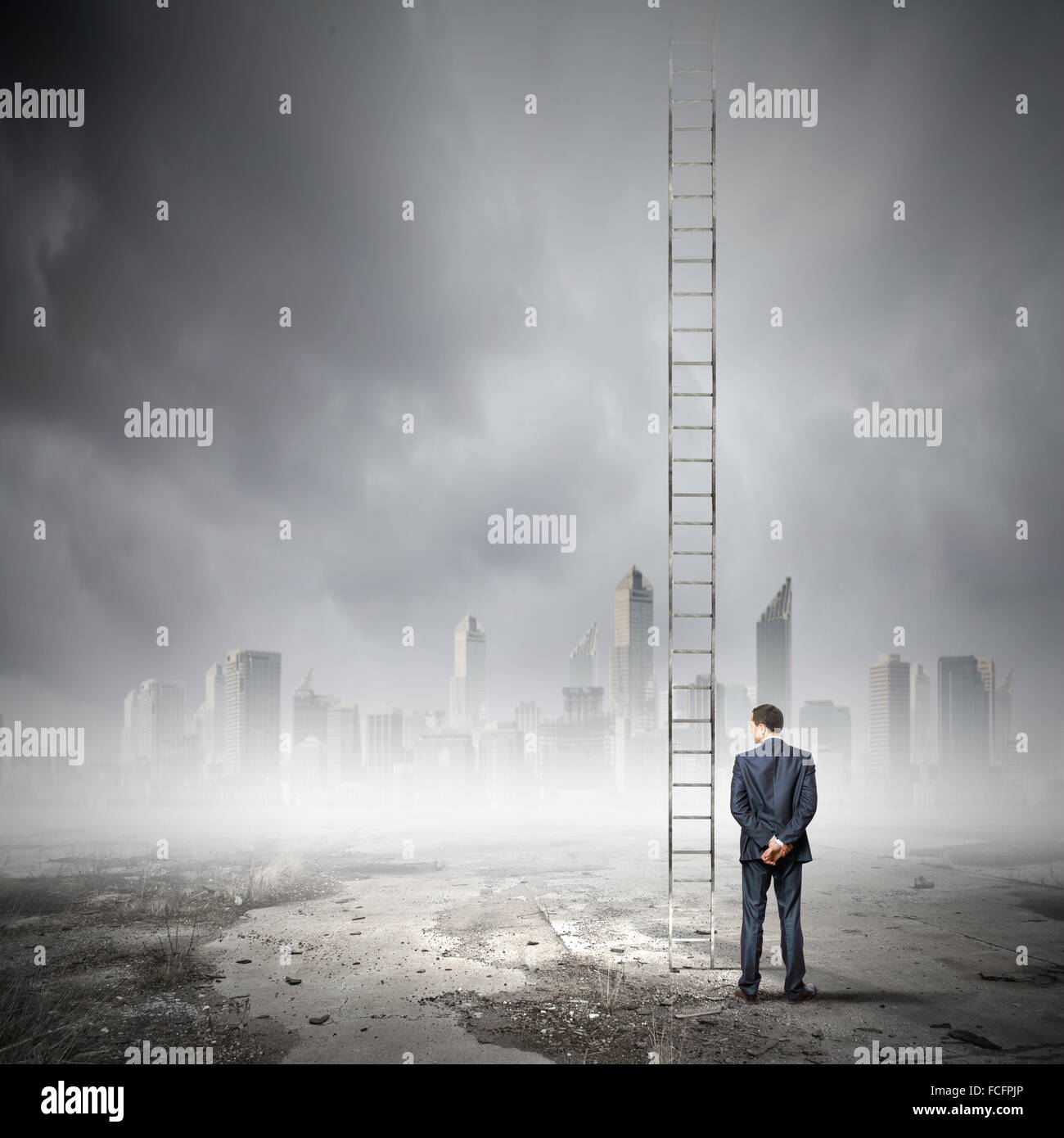 Rear view of businessman standing near ladder going high in sky Stock ...